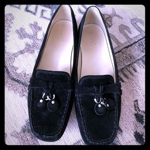 Black suede loafers by UGG